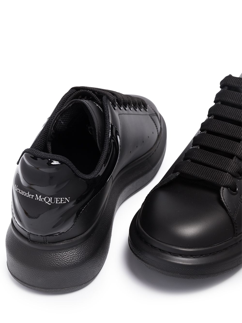 ALEXANDER MCQUEEN Oversized Sneakers Black MAISONDEFASHION.COM ALEXANDER MCQUEEN Oversized Sneakers Black MAISONDEFASHION.COM