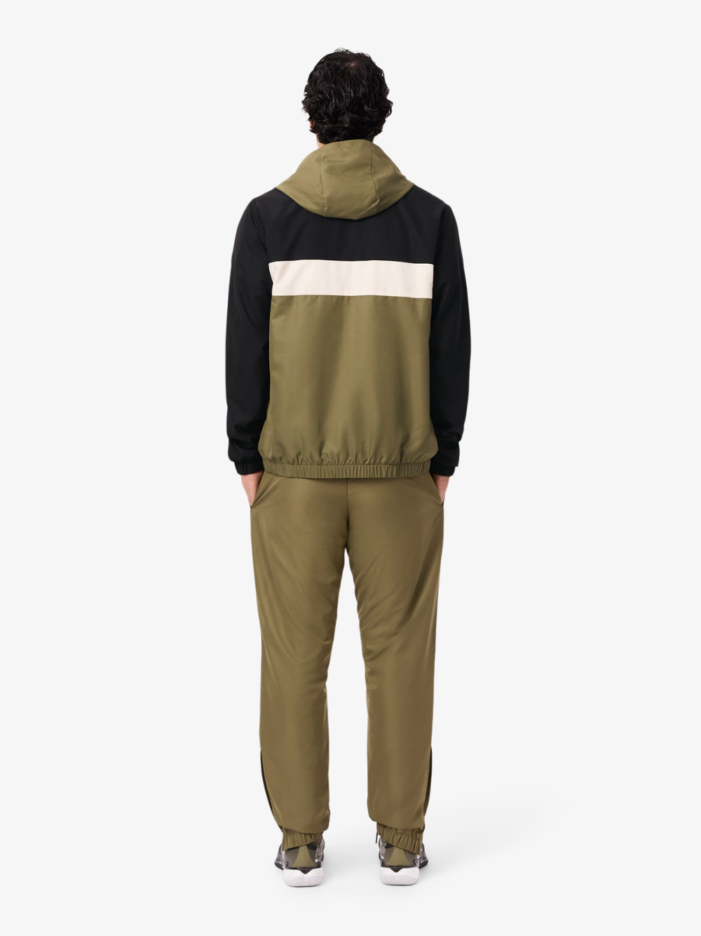 LACOSTE Khaki Green tracksuit pants - detailed view highlighting elastic waistband and tapered athletic fit