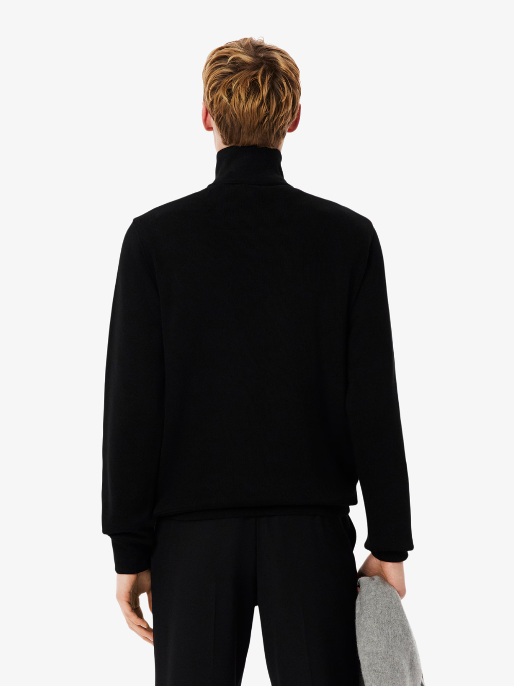 LACOSTE black high neck zip-up sweatshirt lifestyle shot demonstrating sporty styling and comfortable fit