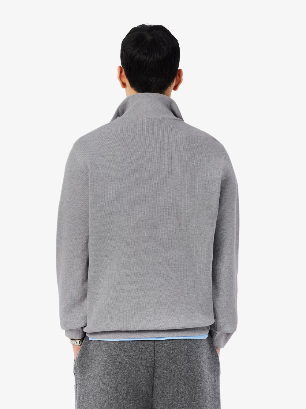 LACOSTE grey high neck zip-up sweatshirt lifestyle shot demonstrating sporty styling and comfortable fit