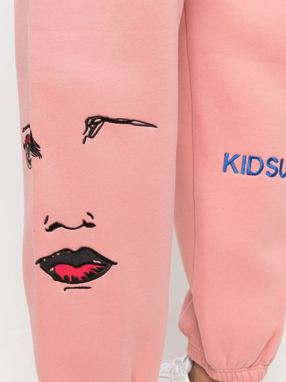KIDSUPER Embroidered two-pocket track pants Pink - MAISONDEFASHION.COM