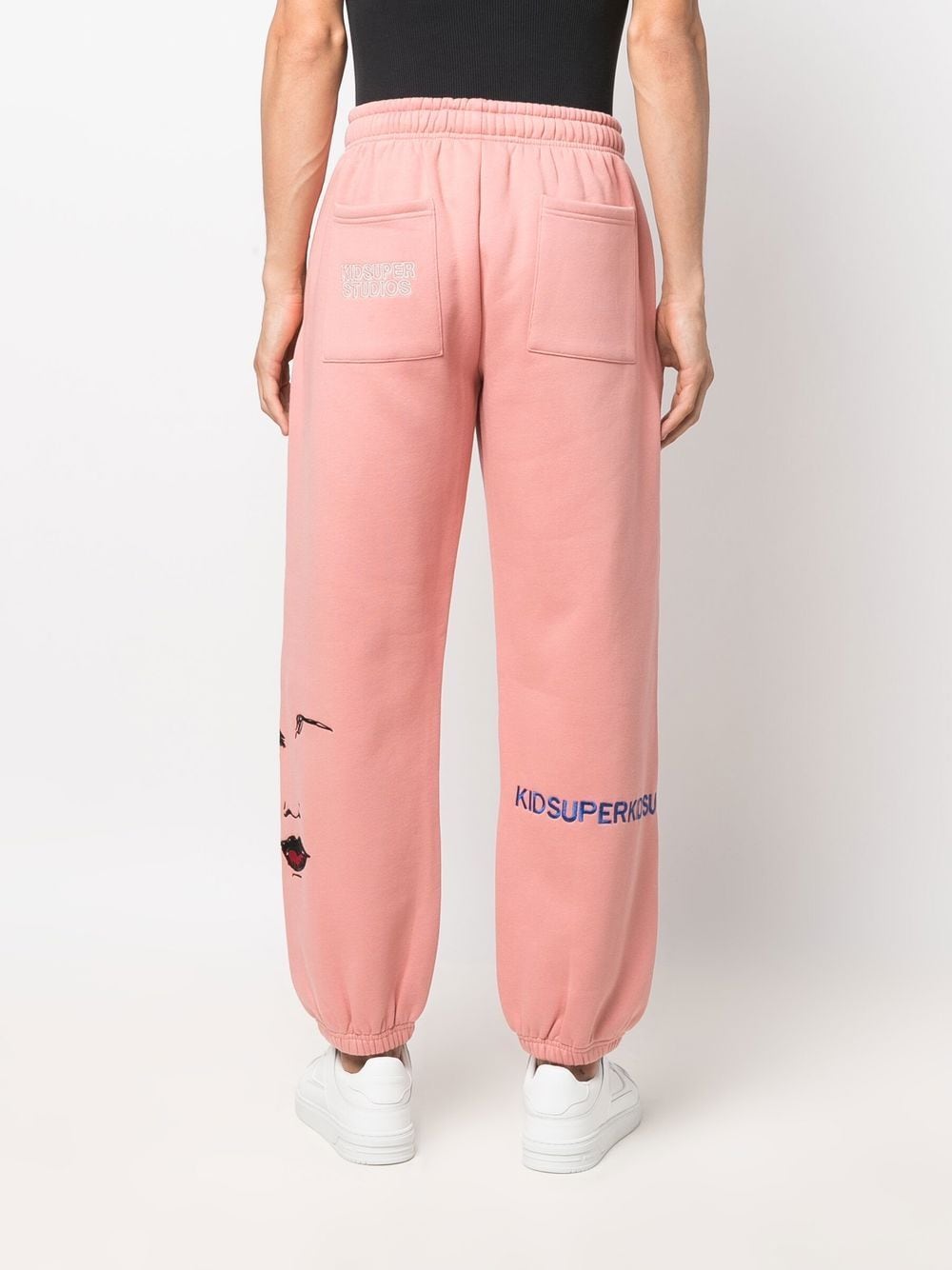 KIDSUPER Embroidered two-pocket track pants Pink - MAISONDEFASHION.COM