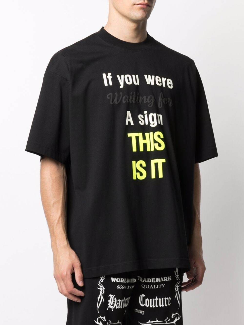 VETEMENTS Slogan-print T-shirt Black - MAISONDEFASHION.COM