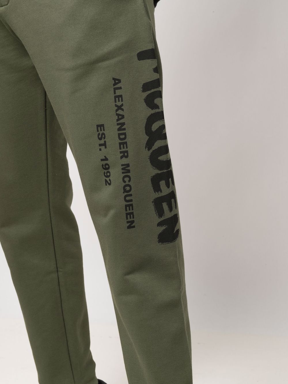 ALEXANDER MCQUEEN Logo Print Sweat Pants Green - MAISONDEFASHION.COM