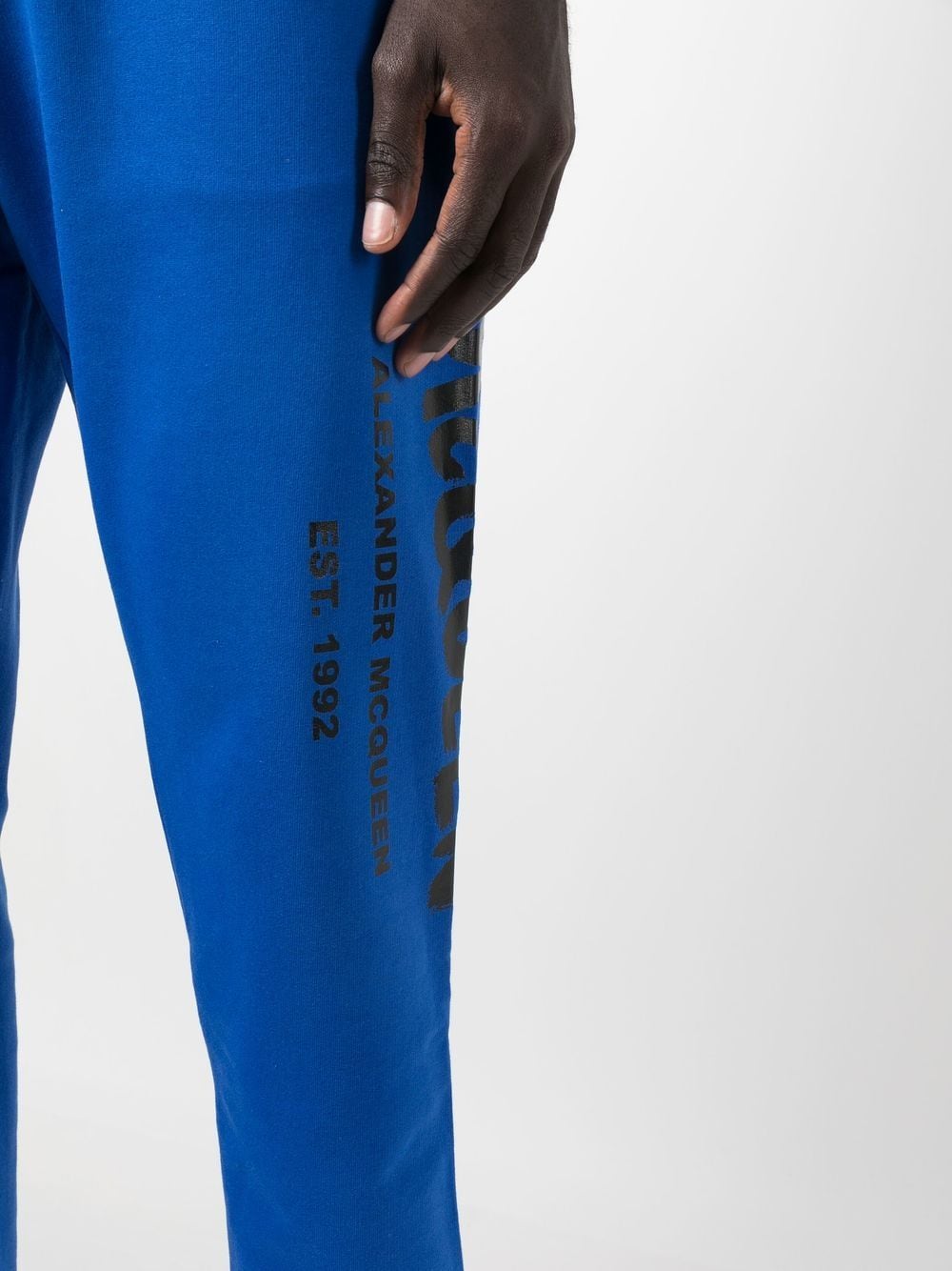 ALEXANDER MCQUEEN Graffiti Logo Print Sweat Pants Royal Blue - MAISONDEFASHION.COM